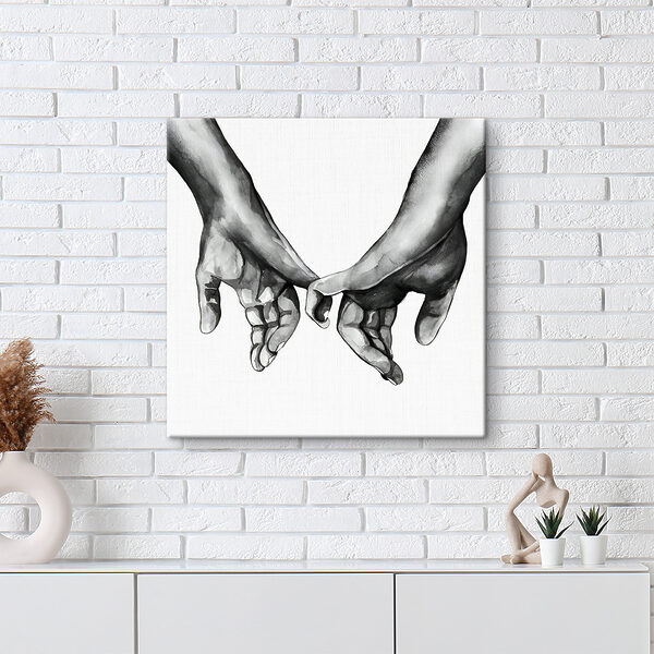 A drawing of two hands holding each other