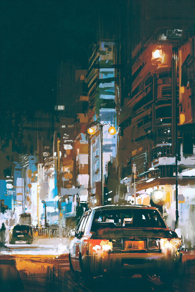 A car driving down a street in a city