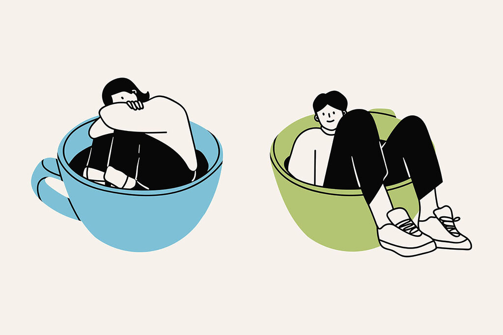 A man and woman sitting in a bowl