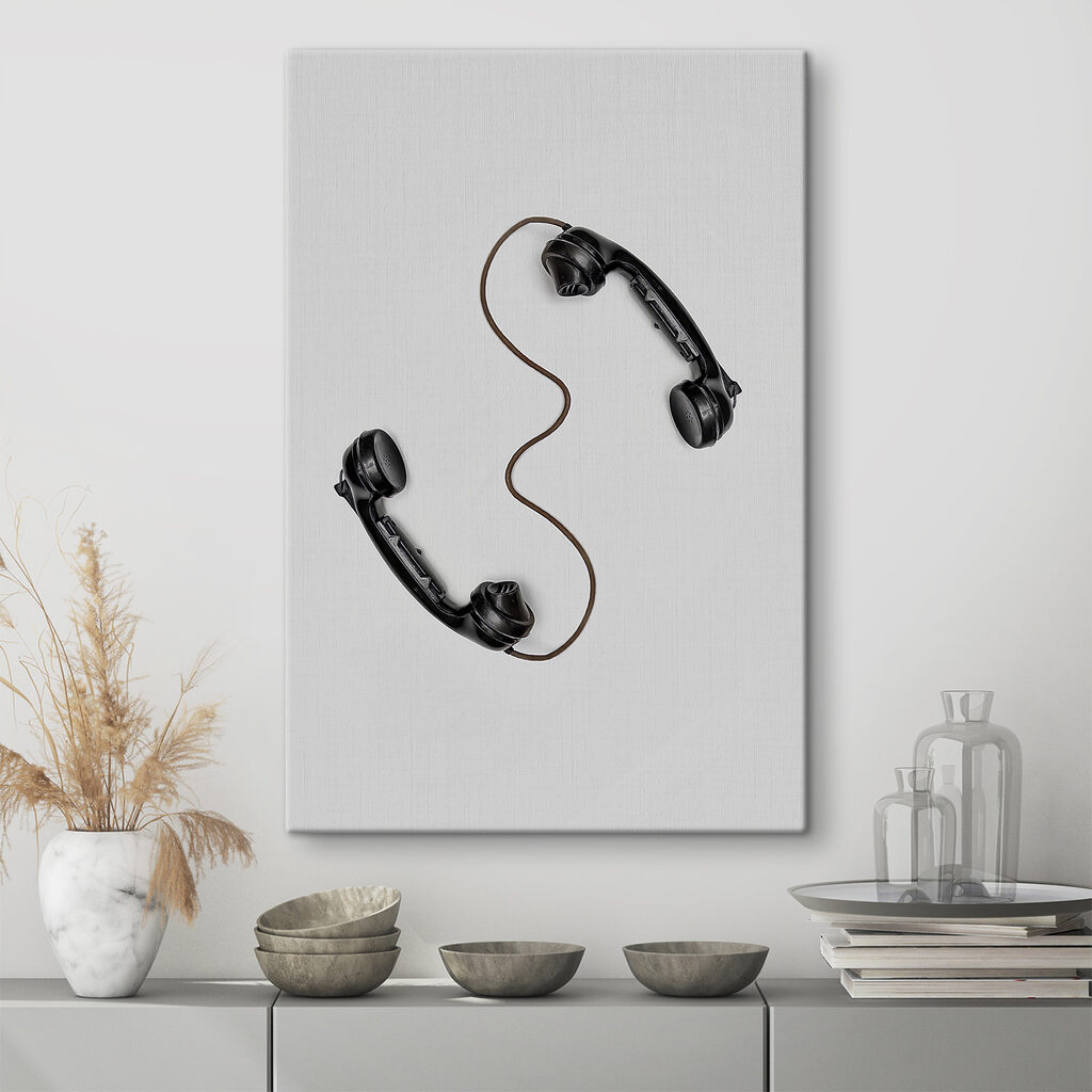 A pair of handsets with a cord