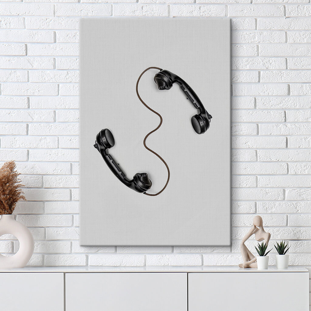A pair of handsets with a cord