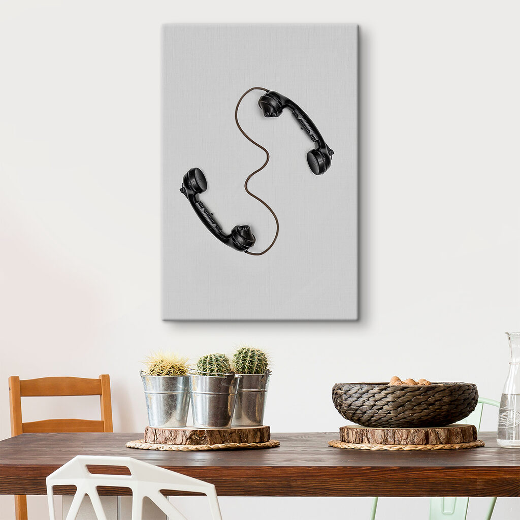 A pair of handsets with a cord