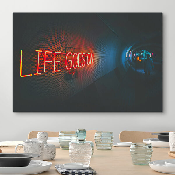 A neon sign in a tunnel