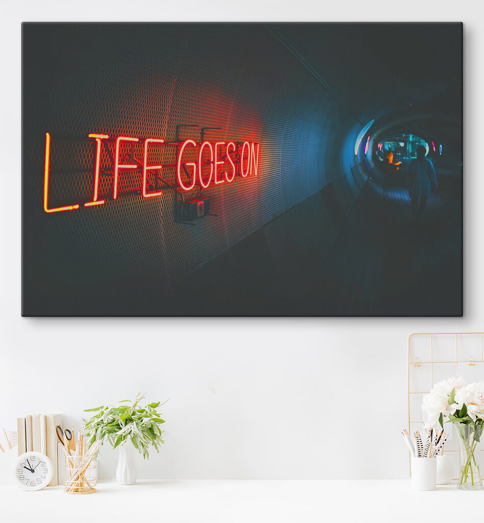 A neon sign in a tunnel