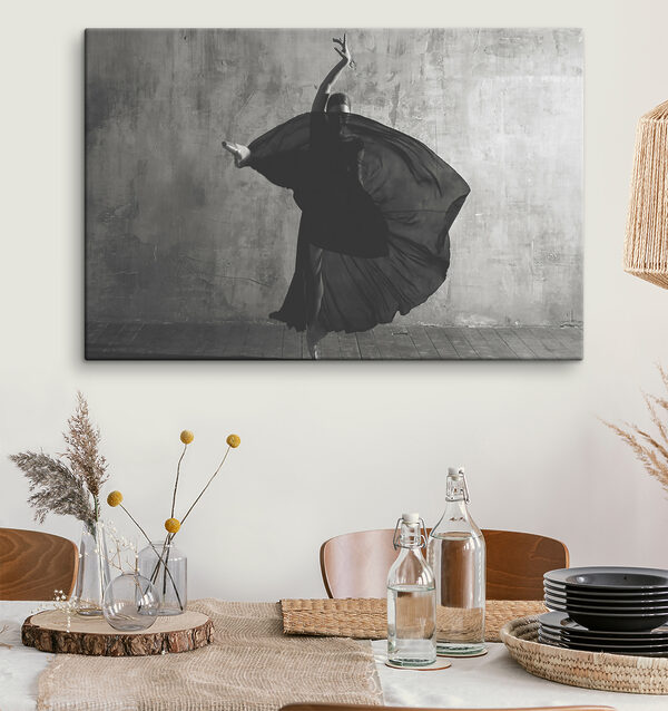 A woman dancing in a black dress