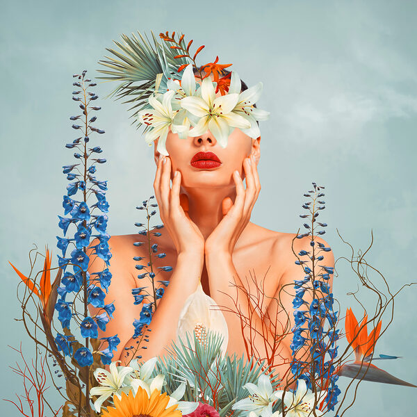 A woman with flowers around her face A woman with flowers around her face