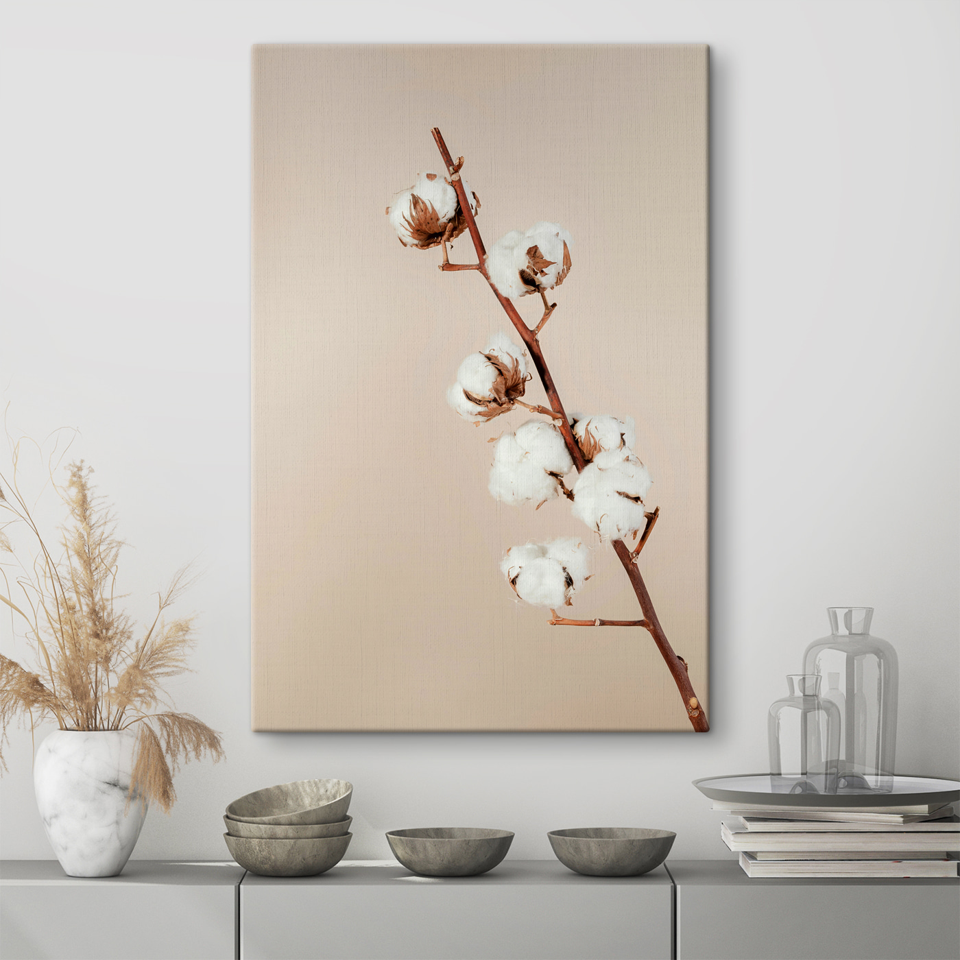 A cotton plant on a branch A cotton plant on a branch