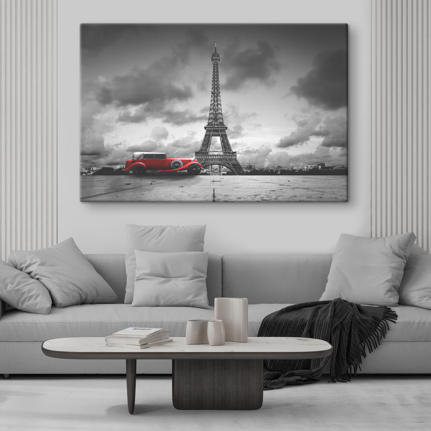 A red car parked in front of a large tower A red car parked in front of a large tower