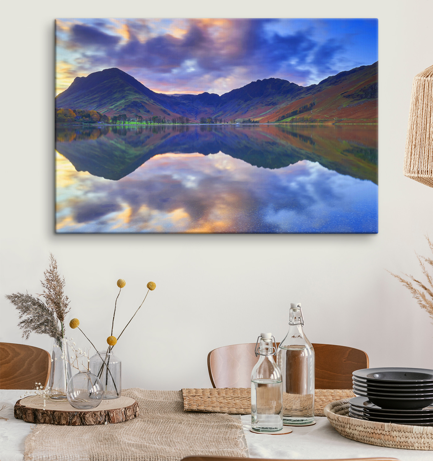 A lake with mountains in the background