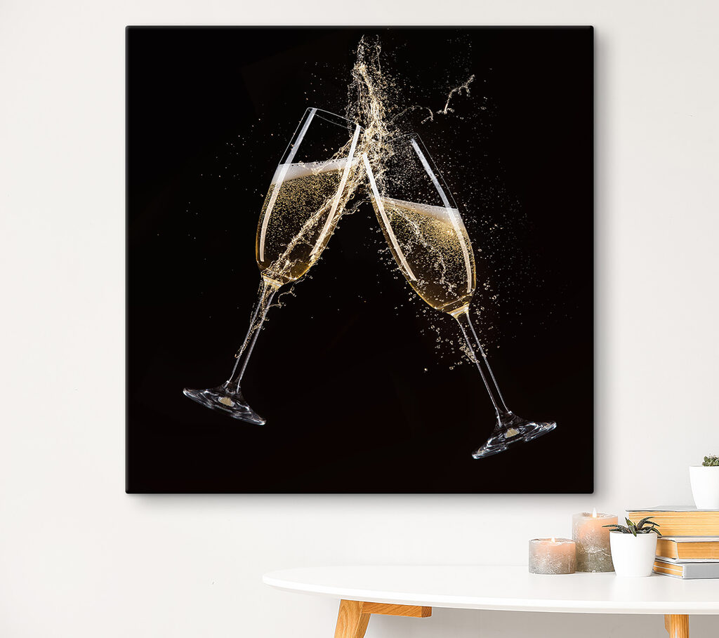 Two glasses of champagne with splashing liquid
