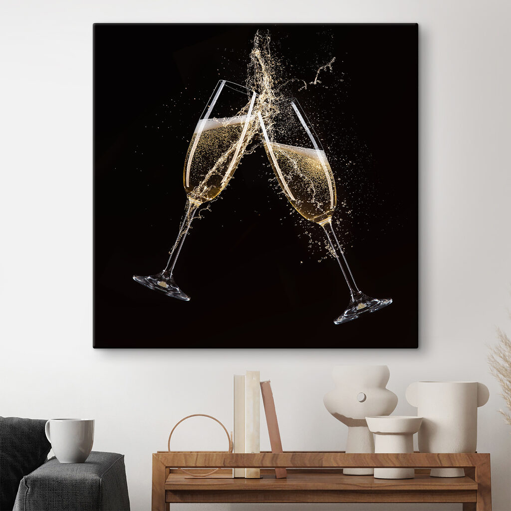 Two glasses of champagne with splashing liquid