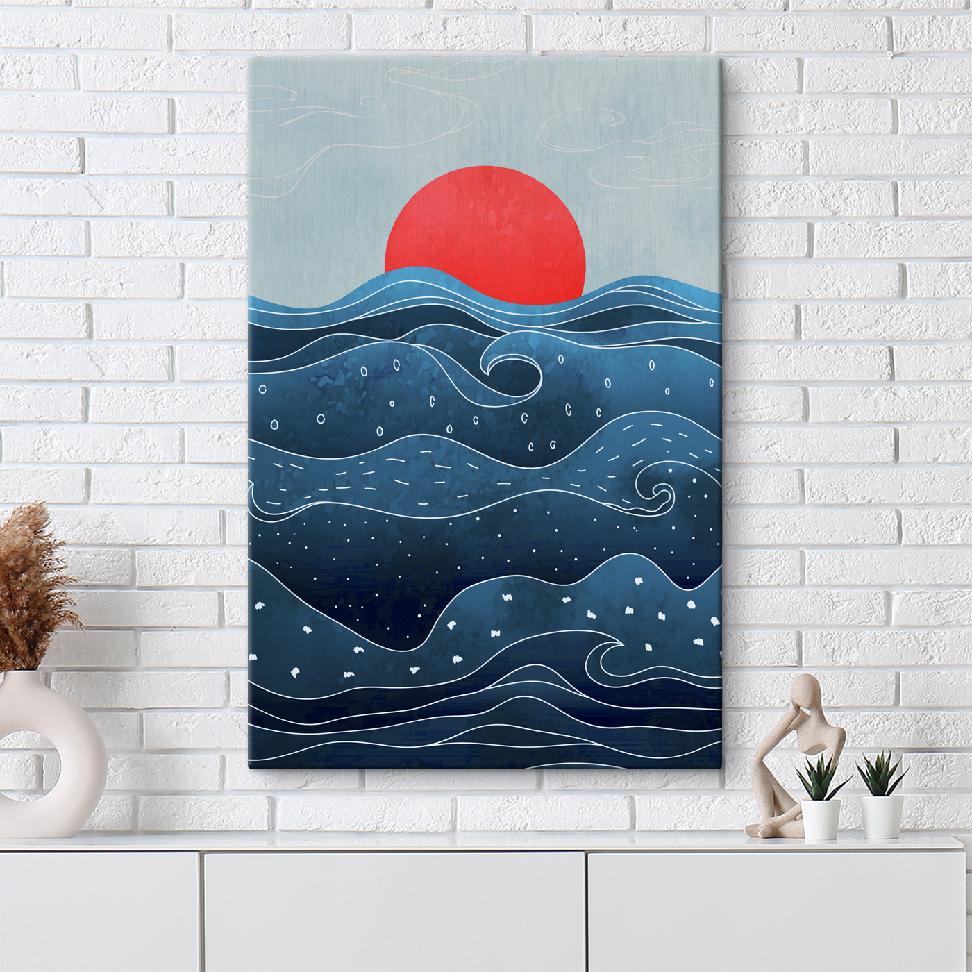 A water with waves and a red sun