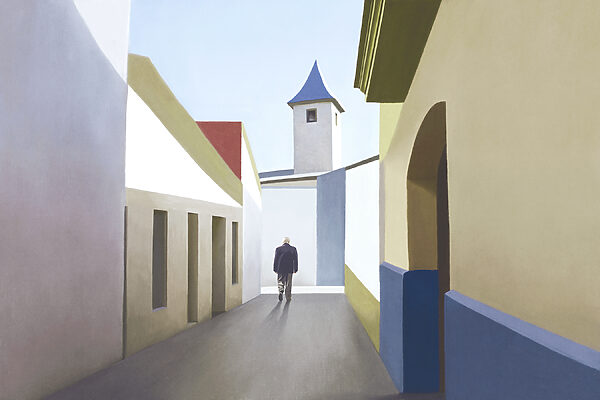 A man walking down a narrow street