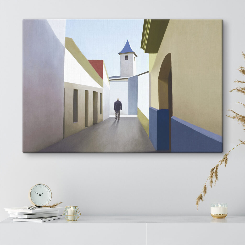 A man walking down a narrow street