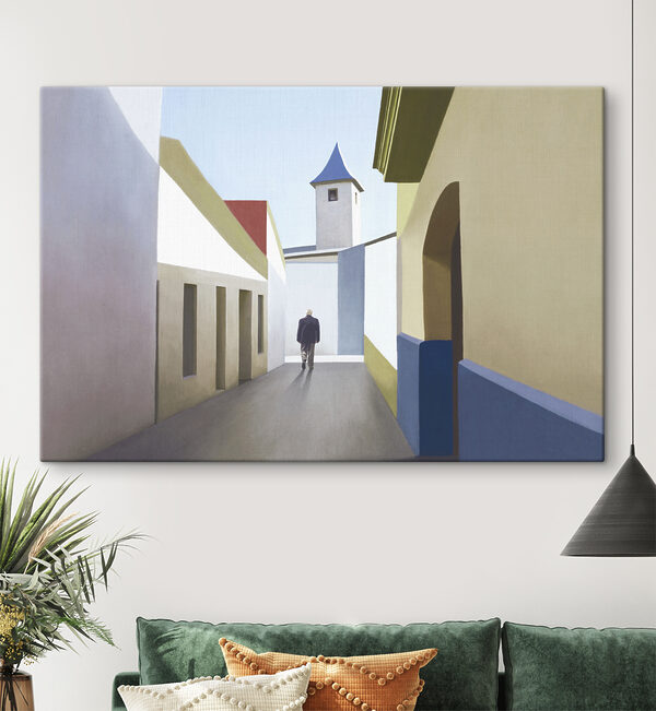 A man walking down a narrow street