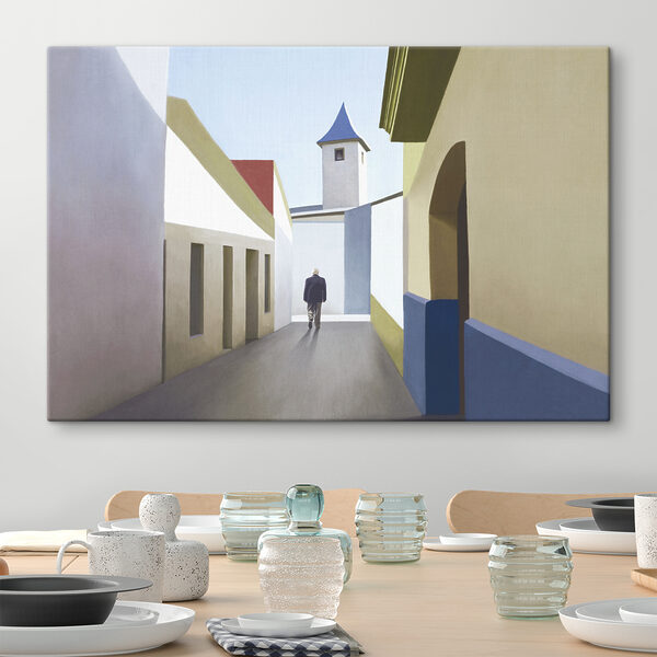 A man walking down a narrow street