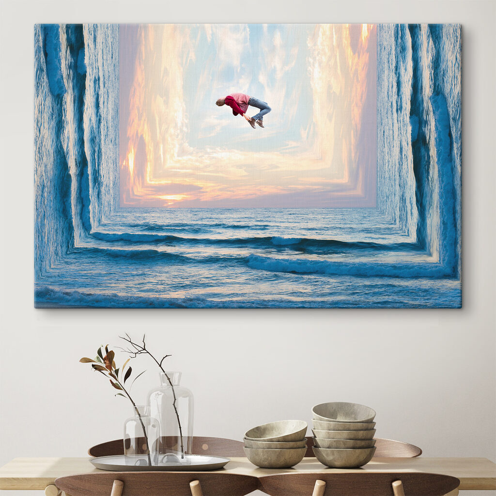 A man jumping in the air over water