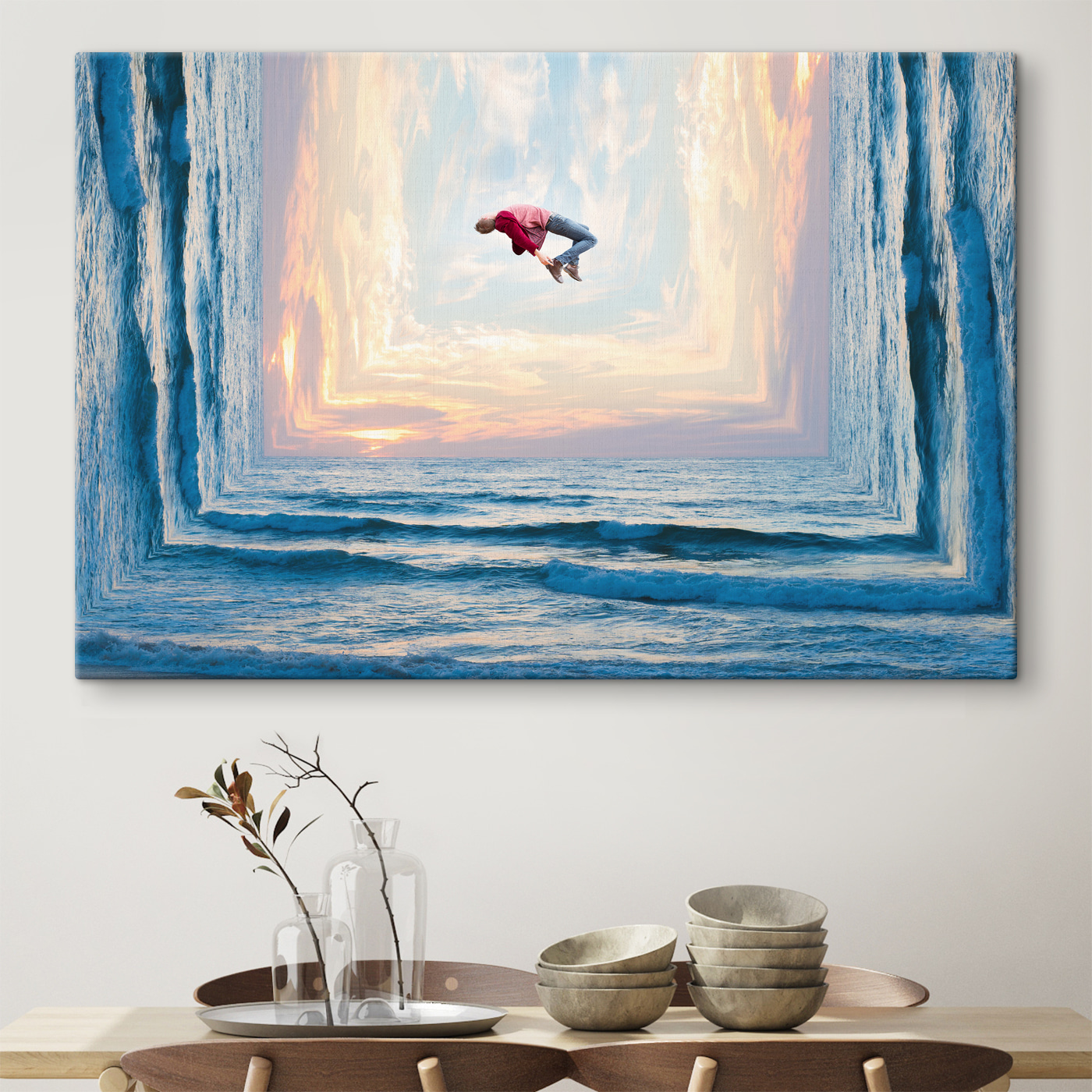 A man jumping in the air over water