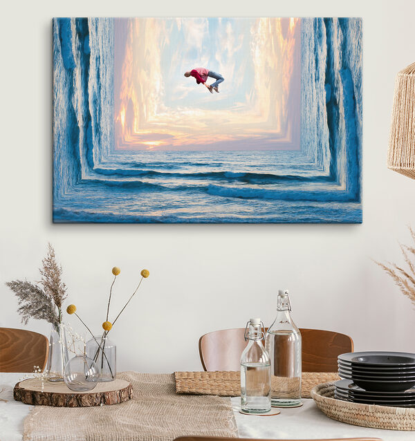 A man jumping in the air over water
