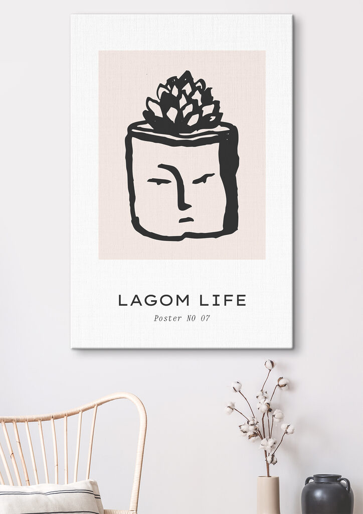 A black and white drawing of a face with a plant