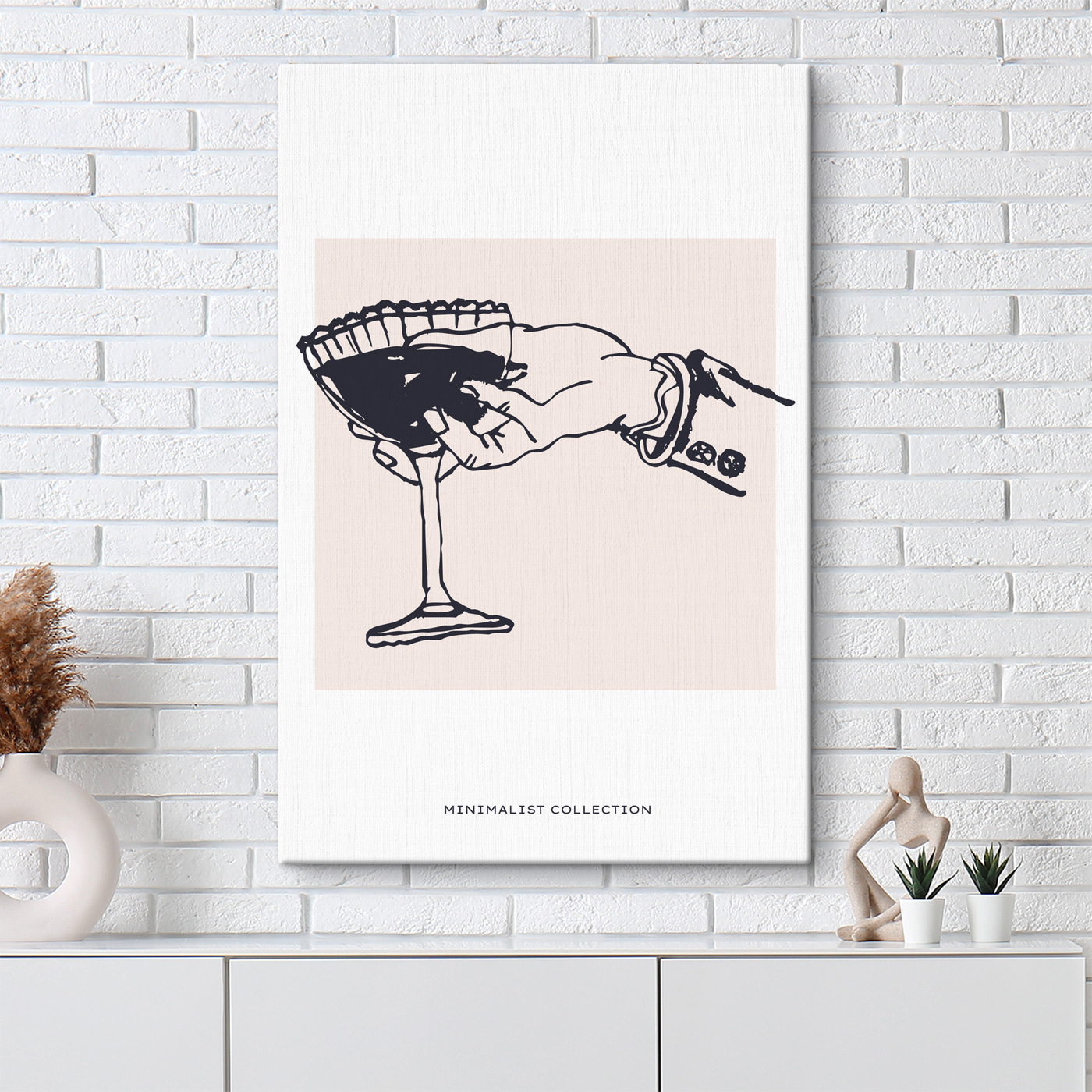 A hand holding a glass of wine