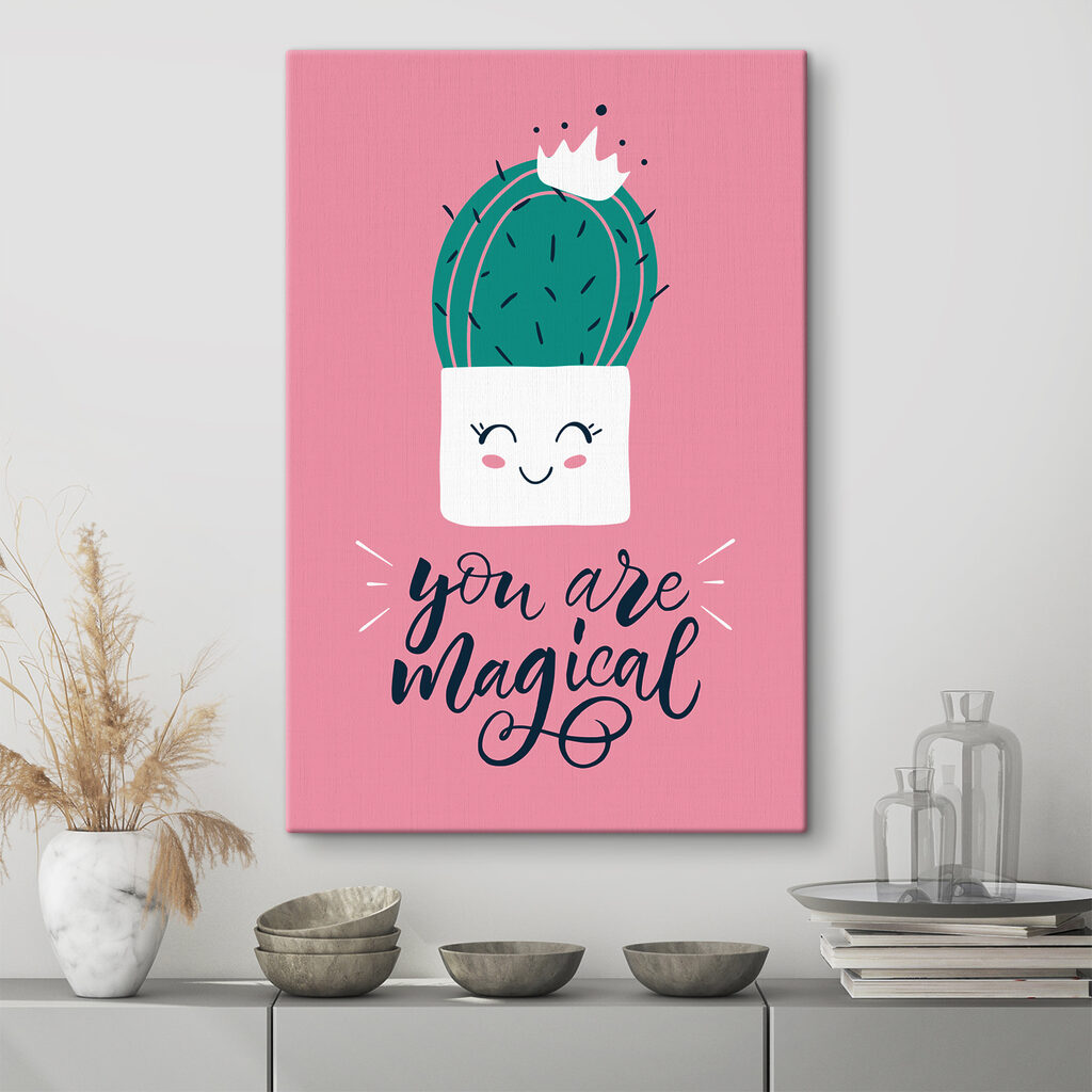 A cactus in a pot with a face and a quote