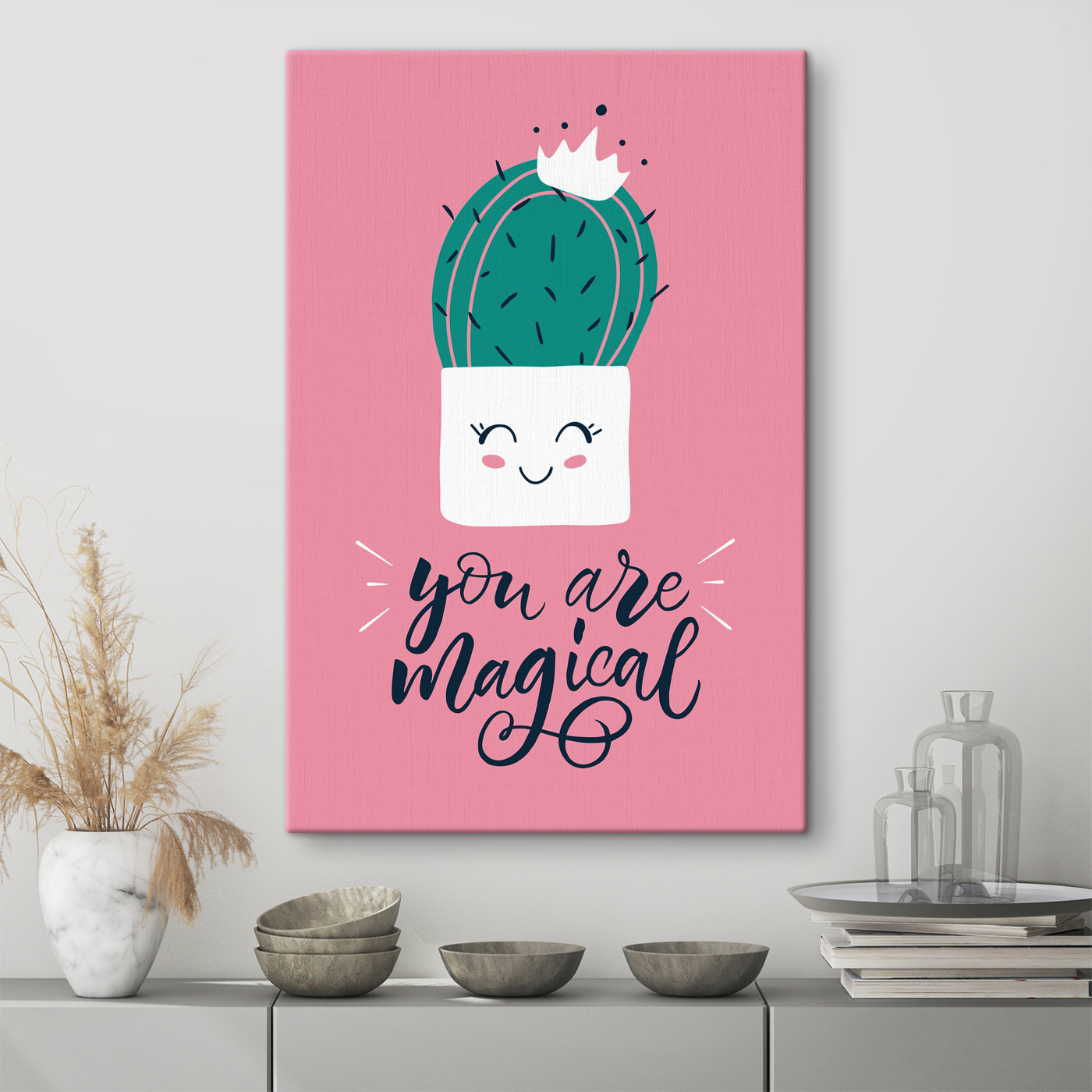 A cactus in a pot with a face and a quote