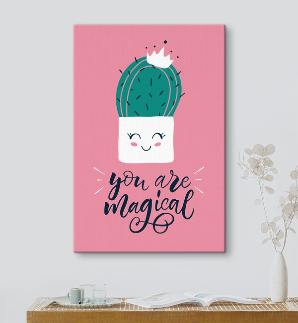 A cactus in a pot with a face and a quote