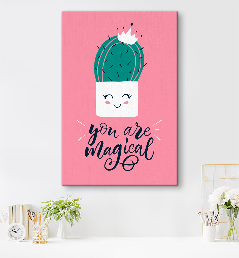 A cactus in a pot with a face and a quote