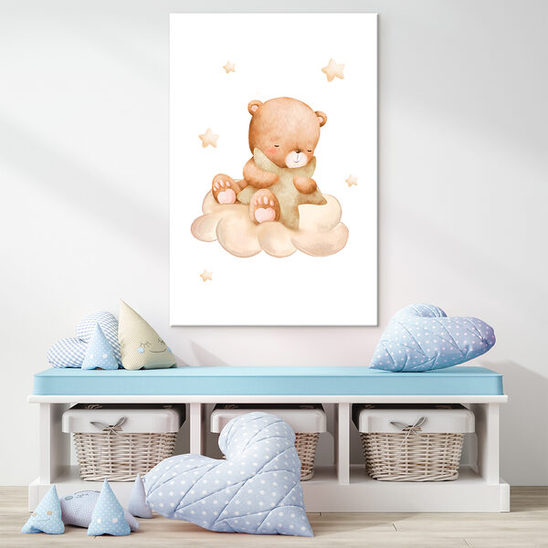 A teddy bear sitting on a cloud