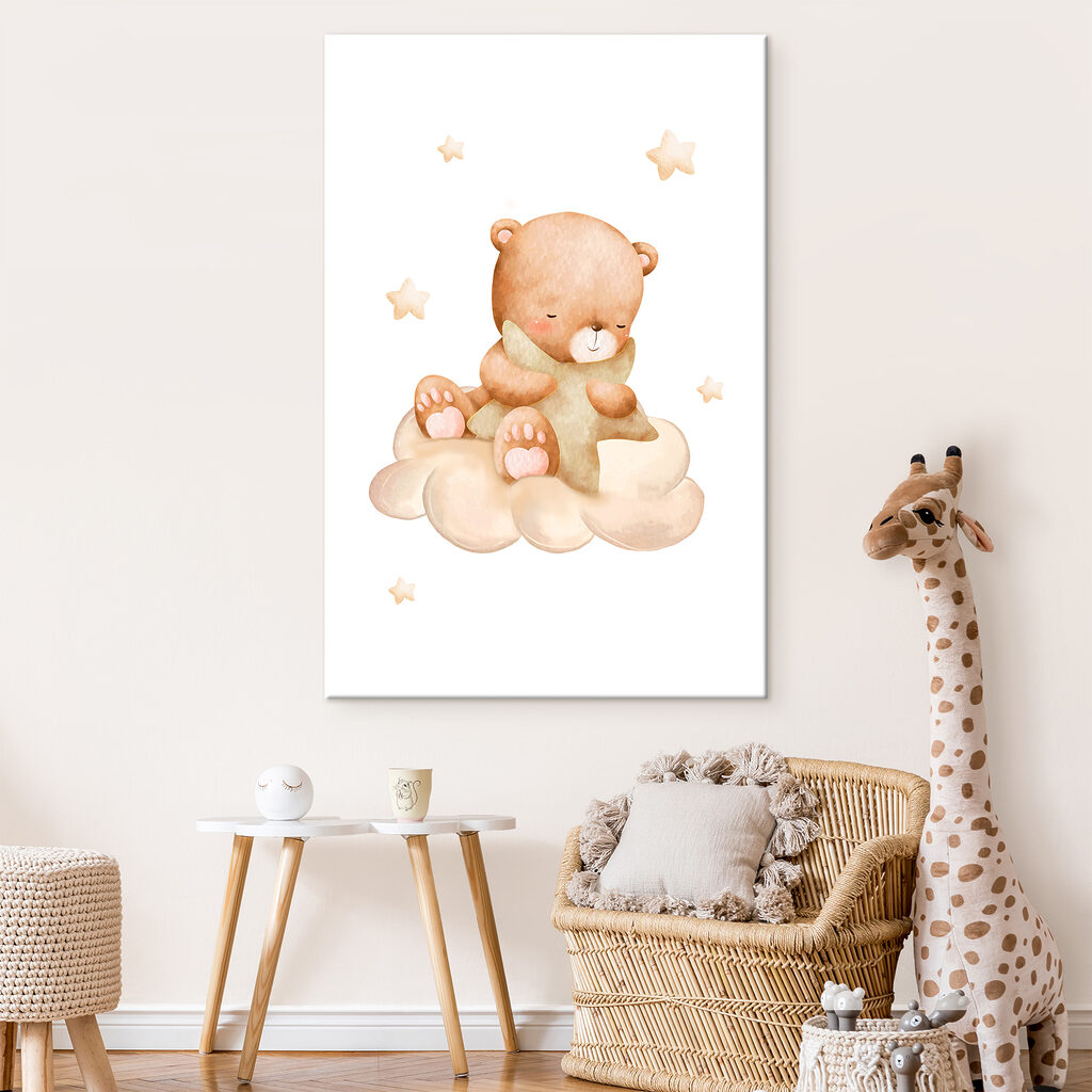 A teddy bear sitting on a cloud