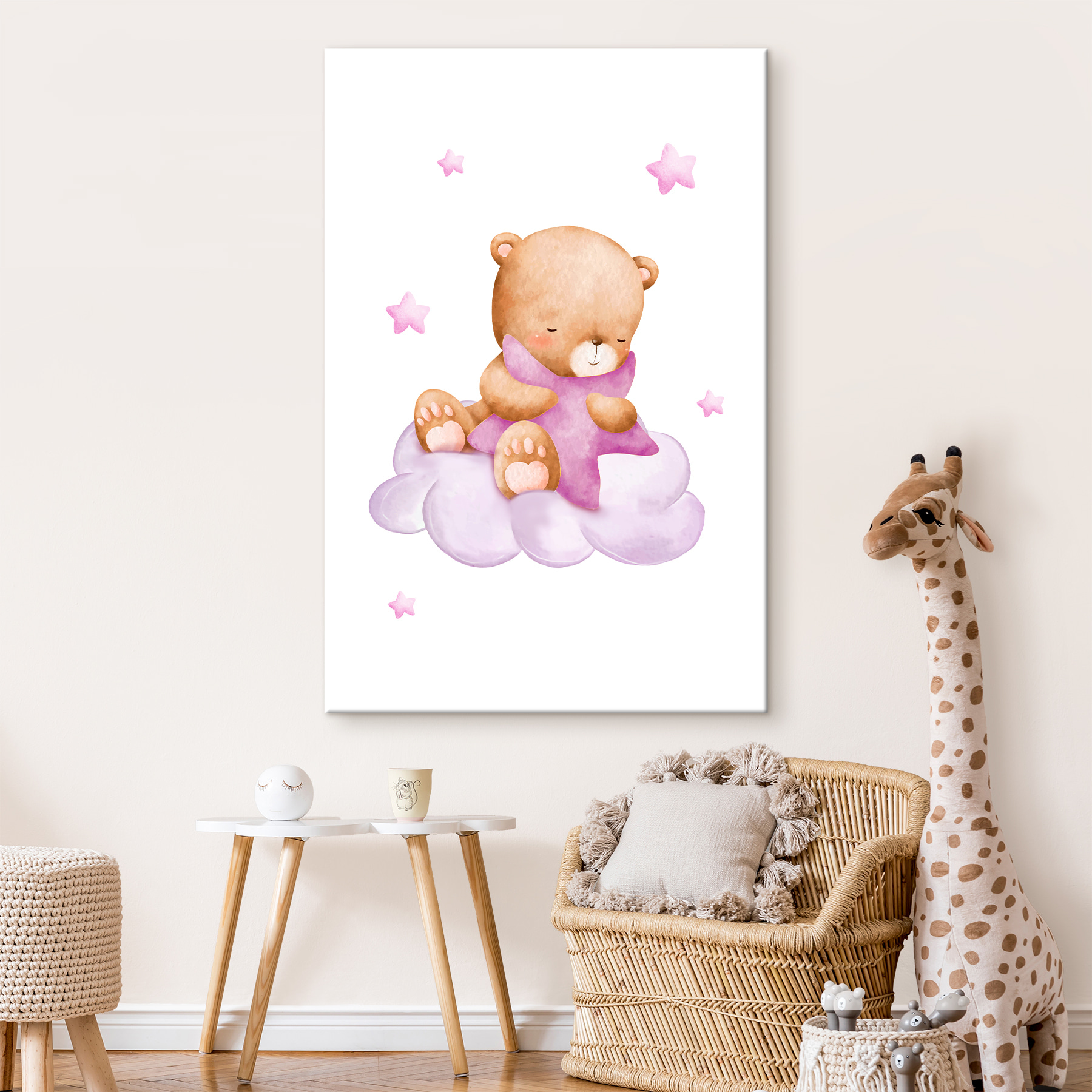 A teddy bear sitting on a cloud