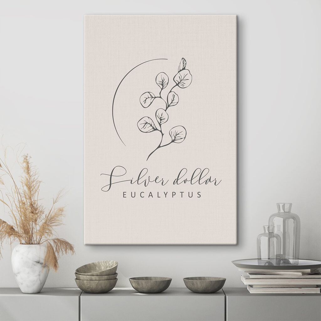 A logo with a branch and leaves