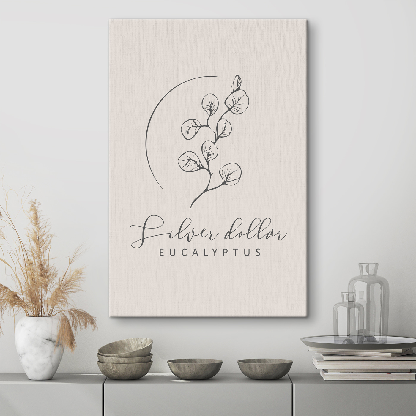 A logo with a branch and leaves