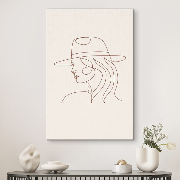 A drawing of a woman wearing a hat