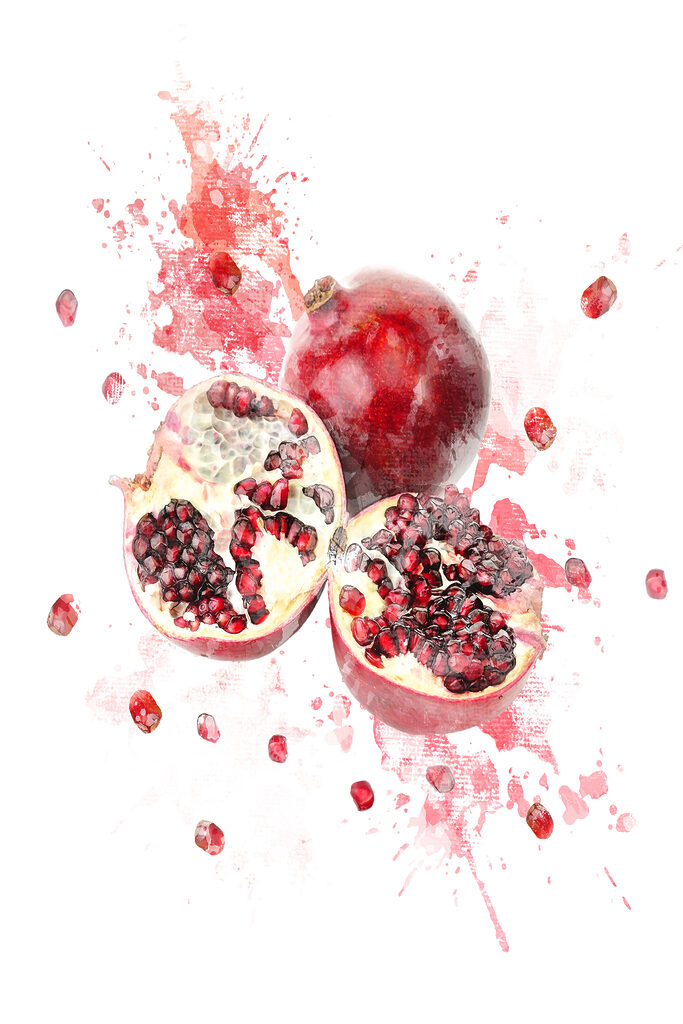 A pomegranate cut in half A pomegranate cut in half
