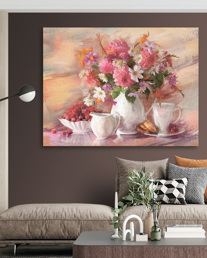 A painting of flowers in a vase and a bowl of croissants
