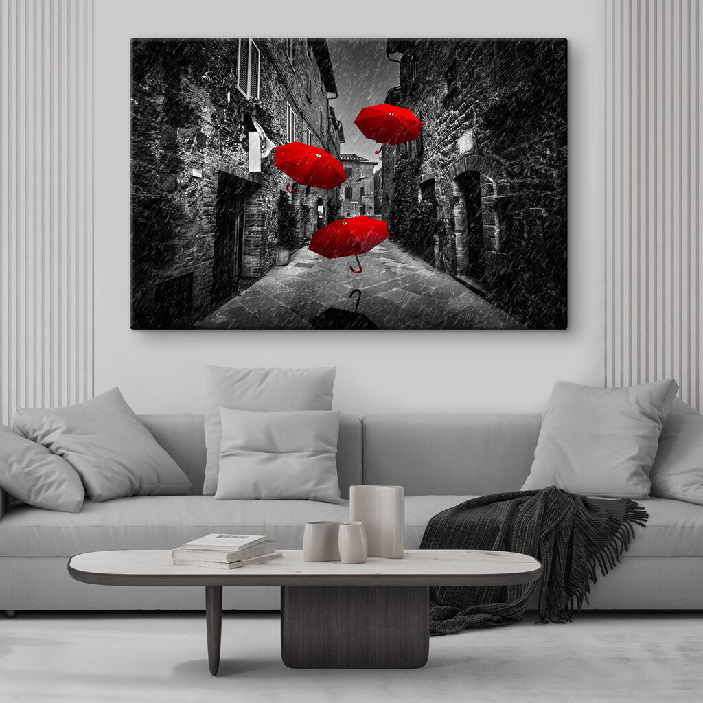A group of red umbrellas flying in the air