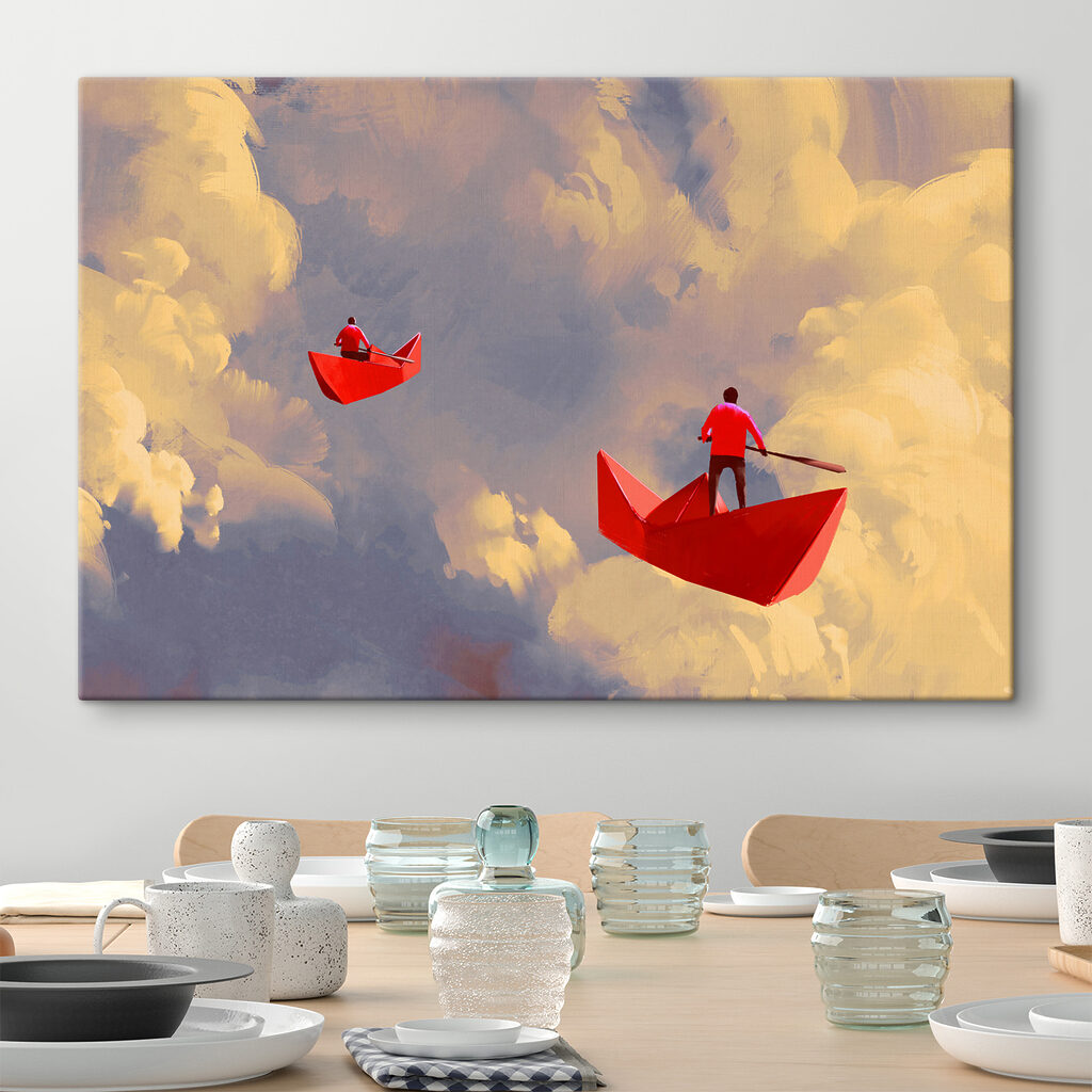Two people in red boats in the sky