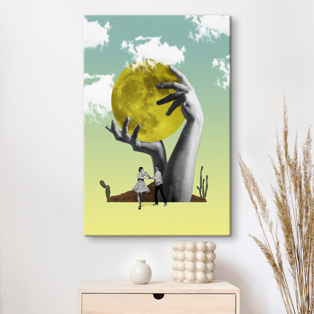 A man and woman holding a yellow moon A man and woman holding a yellow moon