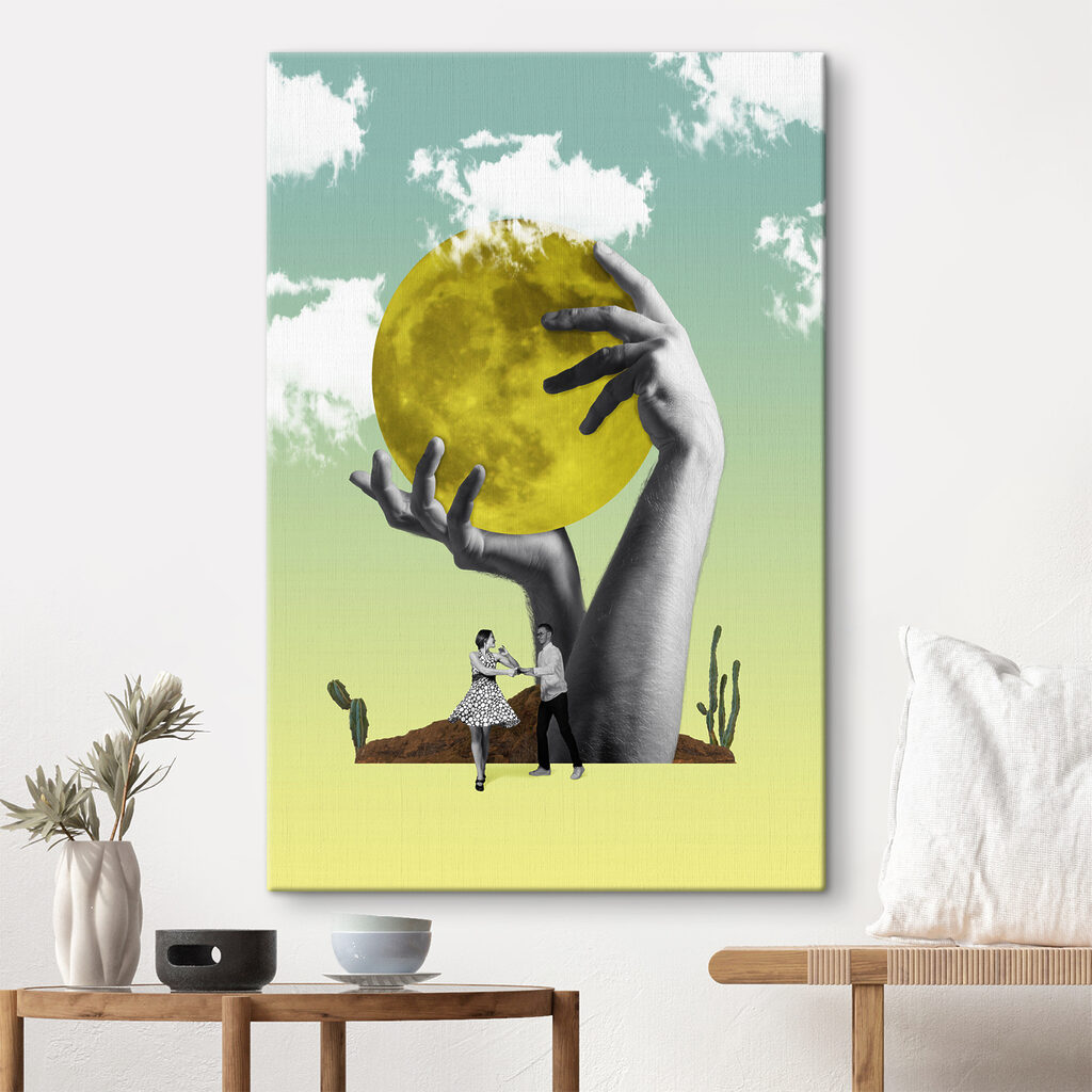 A man and woman holding a yellow moon A man and woman holding a yellow moon