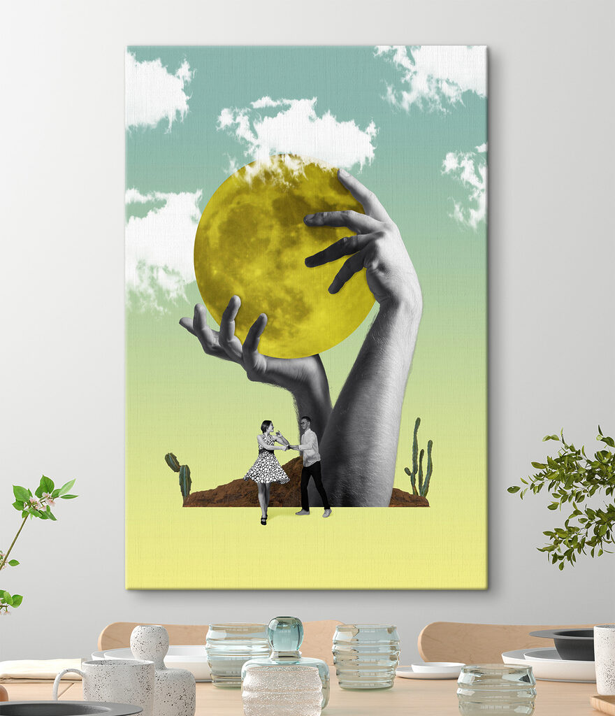 A man and woman holding a yellow moon A man and woman holding a yellow moon
