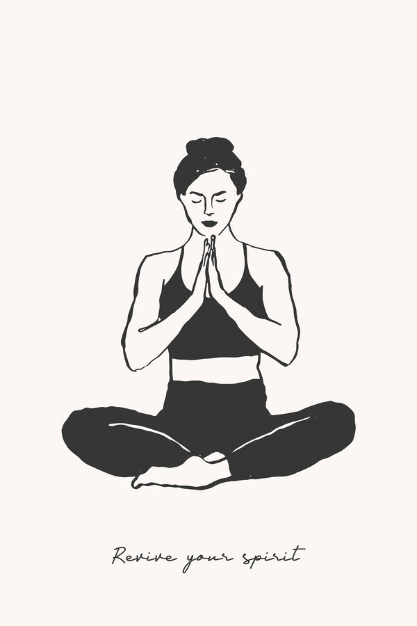 A woman sitting cross legged with her hands together