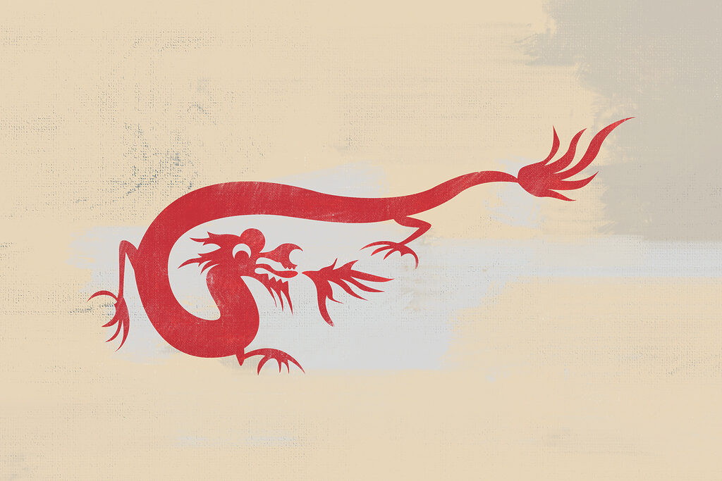 A red dragon on a white surface