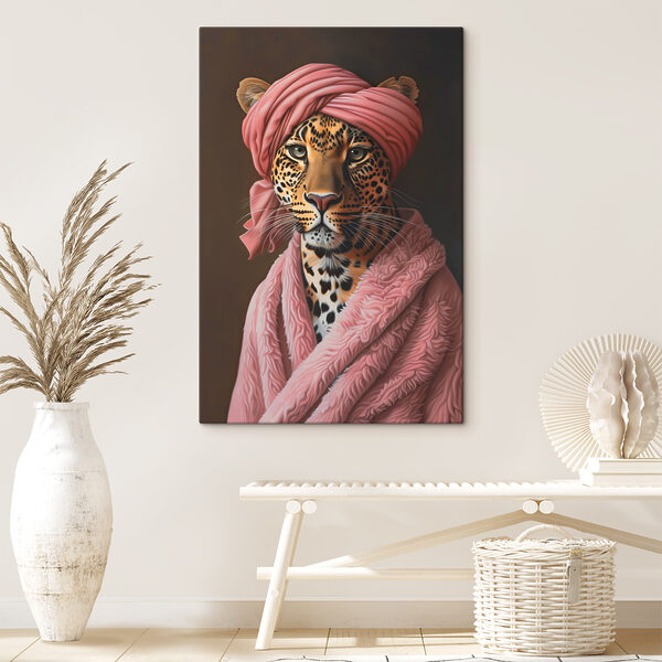A leopard wearing a pink robe and a pink turban