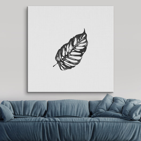 A black leaf on a white background A black leaf on a white background