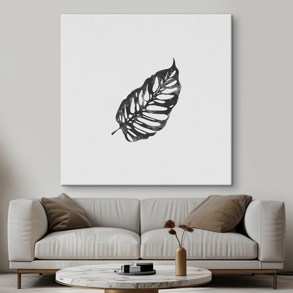 A black leaf on a white background A black leaf on a white background