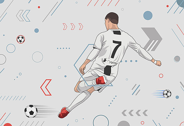 Un jugador de fútbol pateando un balón Un jugador de fútbol pateando un balón