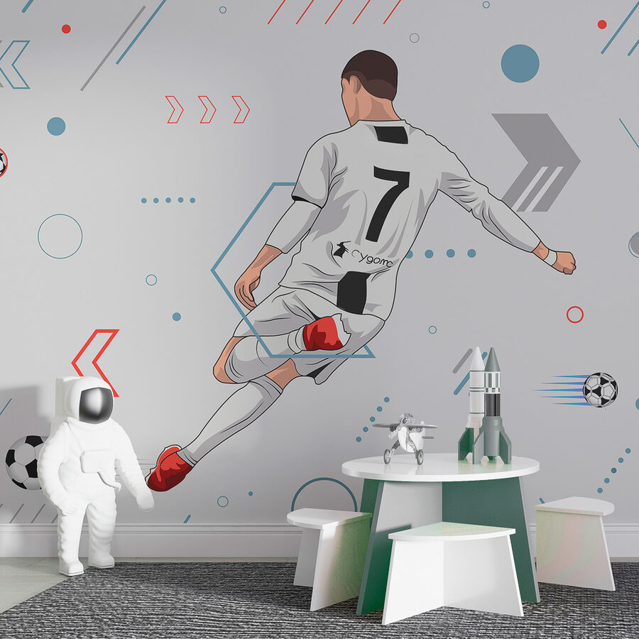 Un jugador de fútbol pateando un balón