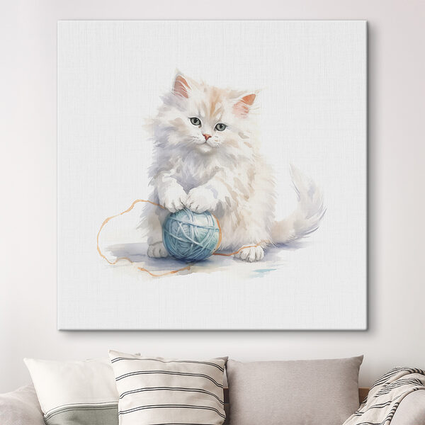 Cuadros Un gato jugando con un ovillo de lana